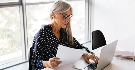 A female retirement plan sponsor managing her employer's retirement plan